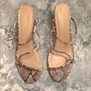 Snakeskin sandals with small block heel